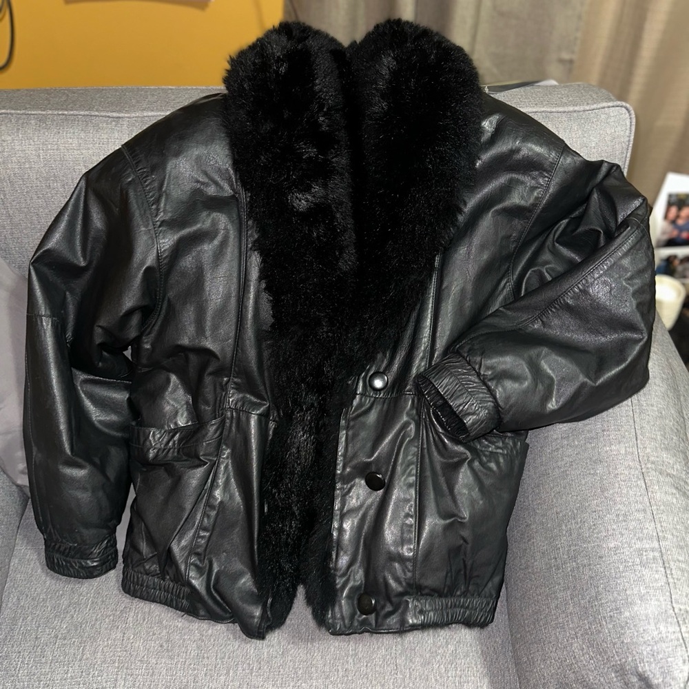Reversible Leather Bomber with Possum Fur, Has pockets on both sides.